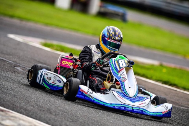 Adventurer having fun wearing karting equipment