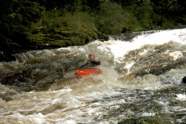 Kayaking white water rapids