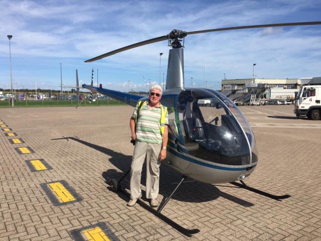 Posing next to the helicopter