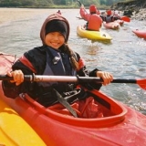 All smiles kayaking in the sun