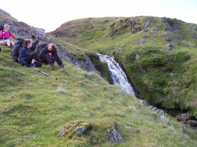 Hikiing close to a waterfall
