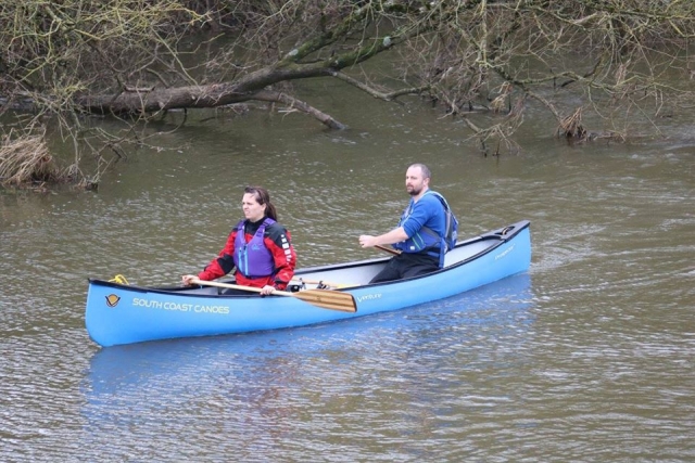 Canoe team on the river