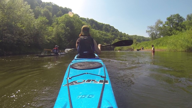 kayaking through the river