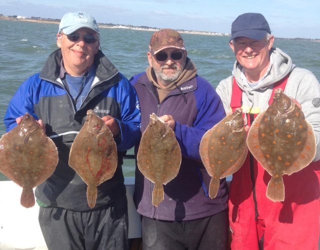 Happy anglers with their catch