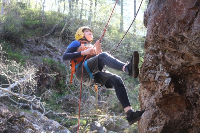 e-19759609-boy-climbing-and-wearing-yellow-helmet-and-orange-buoyany-aids16436133304903.jpg