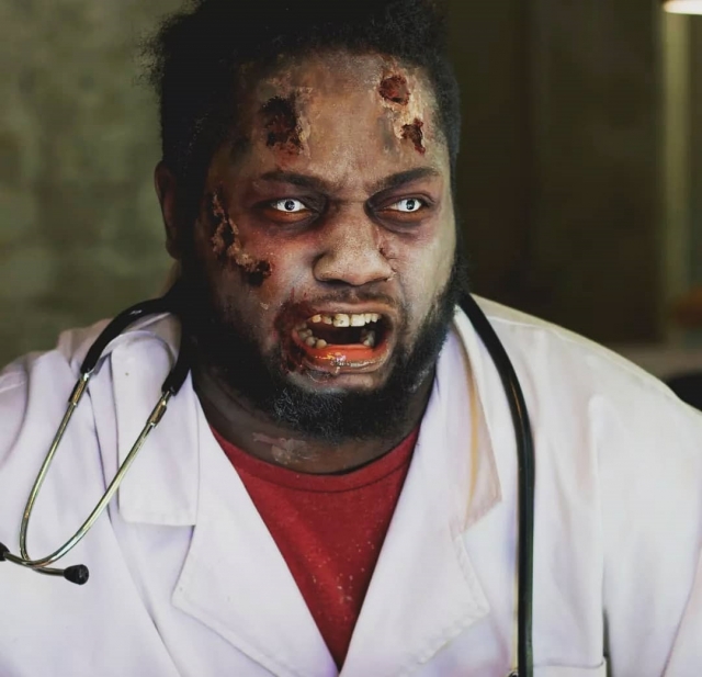 A zombie is behind