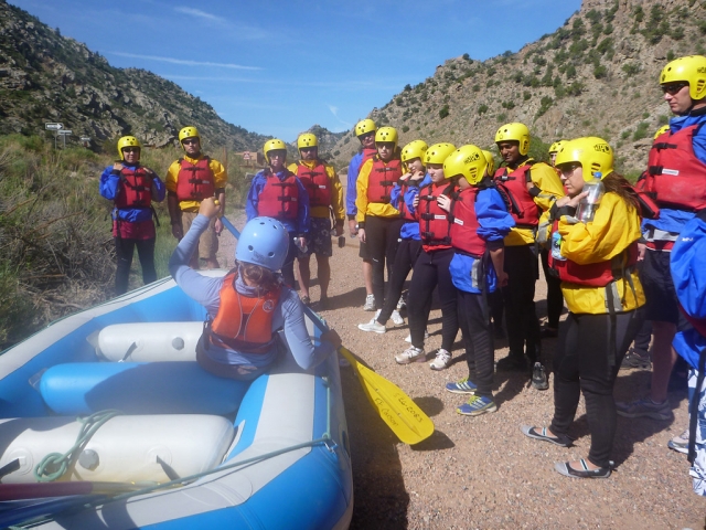Groups getting their briefing before going rafting on the River Findhorn