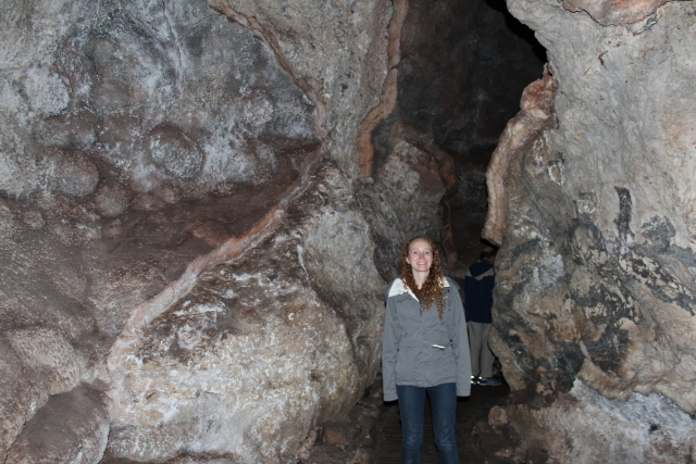 A girl posing before caving