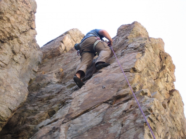 Man reaching the top