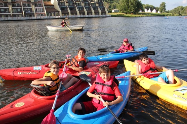 Group of friends in their canoes