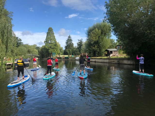Stand-up paddleboarding is a great idea for a vacation