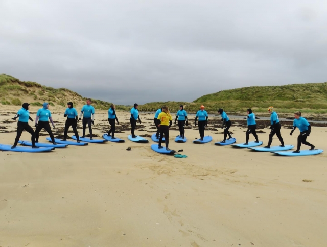Group learning to surf