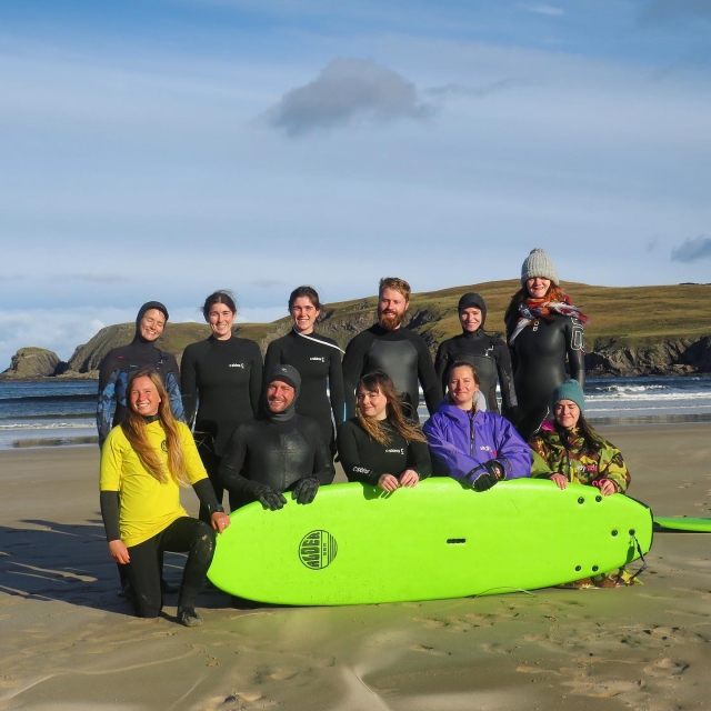 Group enjoying the surf trip